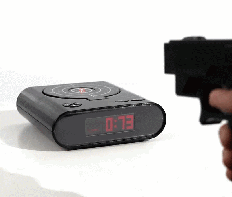 ShotAwake gun alarm clock in use